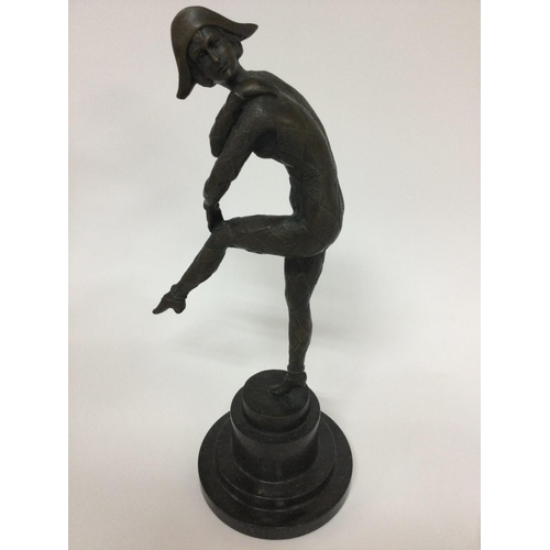 1031 - WITHDRAWN -  A Art Deco style figure on a circular marble stepped base .36 cm