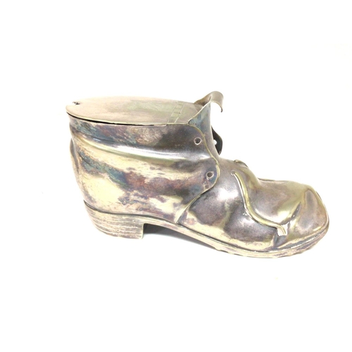 1041 - A silver-plated old boot. 17x9cm. Postage B