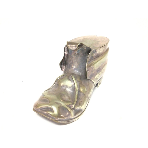 1041 - A silver-plated old boot. 17x9cm. Postage B