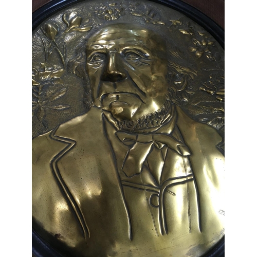 1047 - WITHDRAWN -  A large oval raised brass plaque depicting Gladstone. Measuring 54cm in height