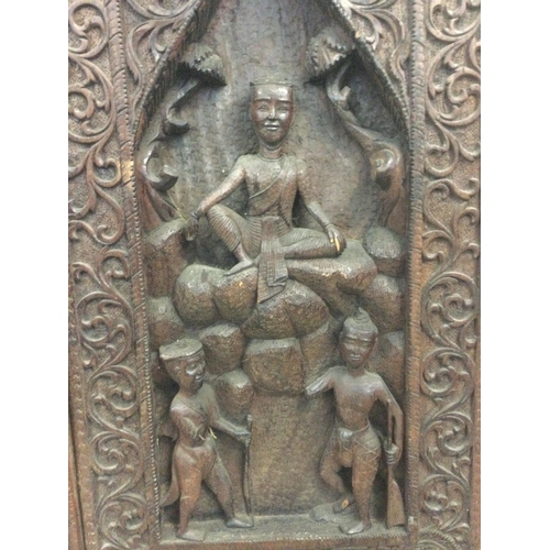 1057 - Pair of carved teak panels, approximate dimensions 60x30cm. Postage category D