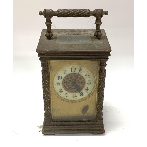 1062 - A small gilt brass 4 glass cased carriage clock, (D)