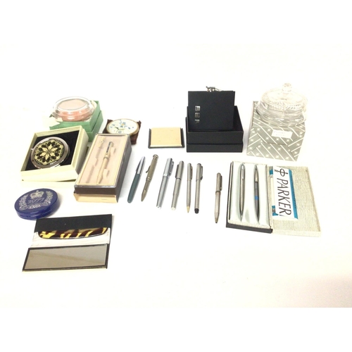 1064 - A collection of various pens and compacts and powder bowls. Including a hip flask. Postage D