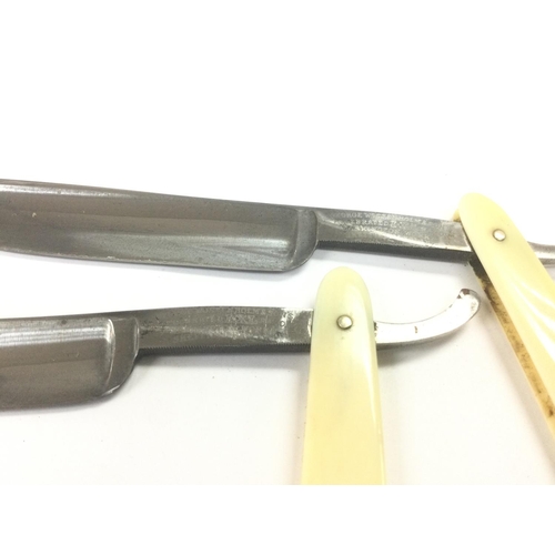 1068 - A rare cased pair of straight razors by George Wostenholm & Sons. Shipping category B.