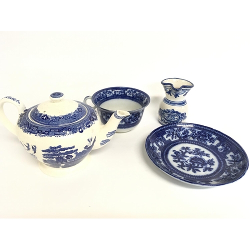 1262 - A collection of blue and white ceramics including a Victorian Fenton Willow Teapot, Morning/ Farmers... 