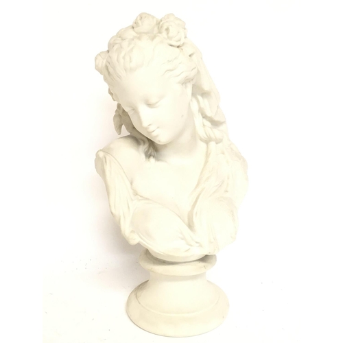 1275 - A Bisque porcelain bust of a lady , has Ben restored 24cm tall. postage category D. NO RESERVE