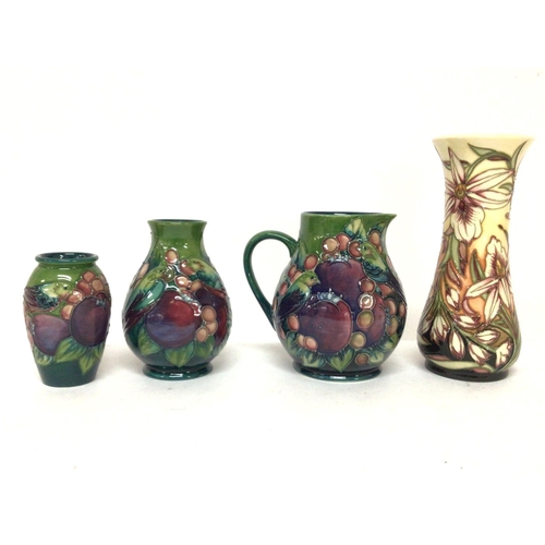 1289 - A collection of Moorcroft vases including a limited to 350 vase designed by Shirley Hayes. Heights r... 