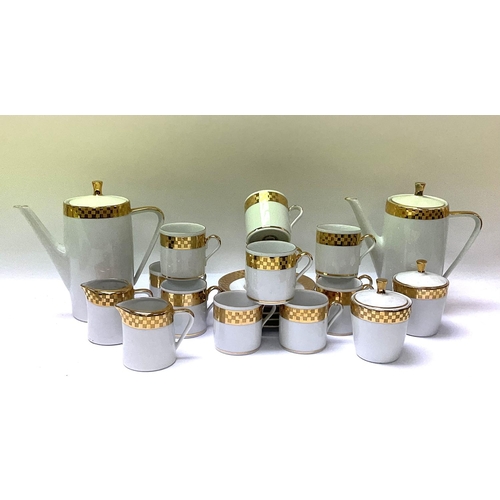 1314 - A German white and gilt porcelain coffee set. (D). NO RESERVE