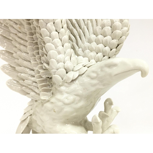 1364 - Blanc De Chine porcelain Eagle , has a hairline crack at the base. approximately 36cm tall. Postage ... 