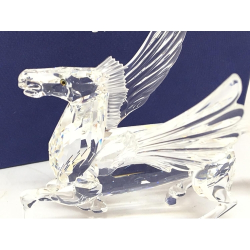 1394 - A boxed Swarovski Pegasus figurine, no obvious damage postage category D