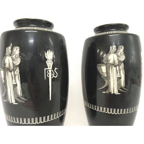 1412 - A pair of Falcon Ware J.H.W & Sons black and white ceramic vases, postage category D approximately 2... 