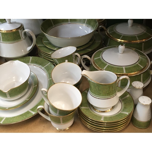 1441 - A Noritaki porcelain dinner set The Eroica set pattern 2041 decorated with green on white with turee... 