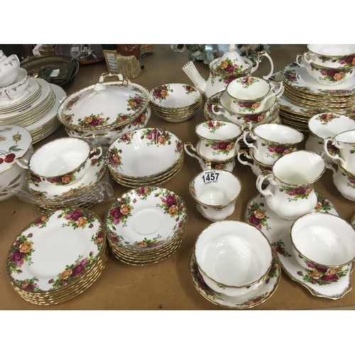 1457 - A collection of Royal Albert Country Roses tea/dinner service, including tureen, gravy boat, tea pla... 