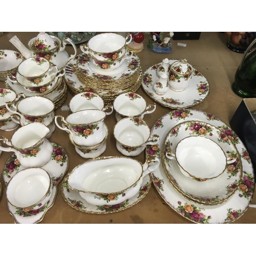 1457 - A collection of Royal Albert Country Roses tea/dinner service, including tureen, gravy boat, tea pla... 