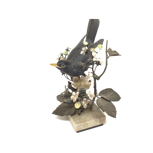 1464 - An Albany fine China model of a blackbird with COA. Approximately 25x20cm. Postage D