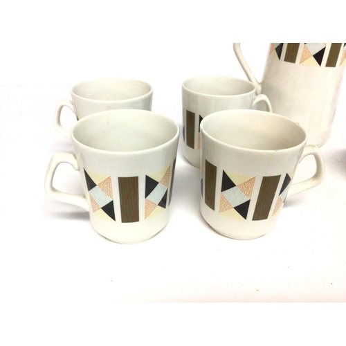 1493 - A mid 20th century Beswick coffee set. Damage to one cup as shown in last picture. Postage D.