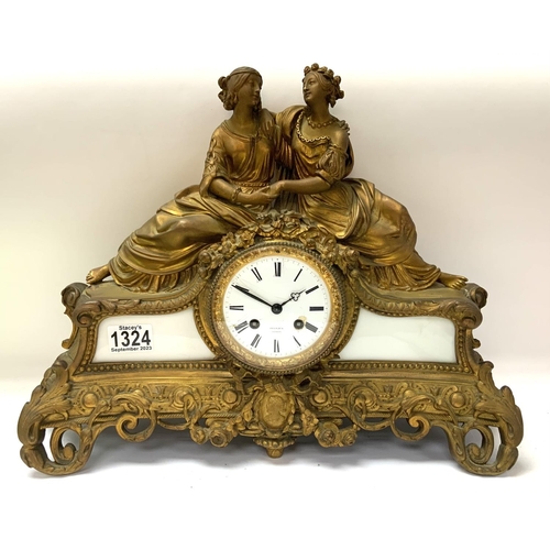 1556 - A French Gilt metal and Glass mantle clock, marked for Franjus, A Paris. H.34cm x W. 46cm.