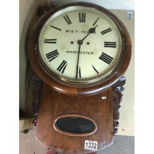 1564 - A mahogany wall clock the circular dial with Roman numerals W+F Terry Manchester with visible pendul... 