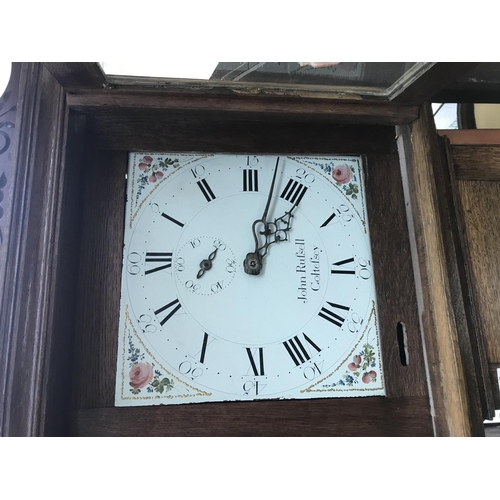 1617 - A oak long case clock the enamel painted dial with Roman numerals, John Rufsell , Coltefsey .