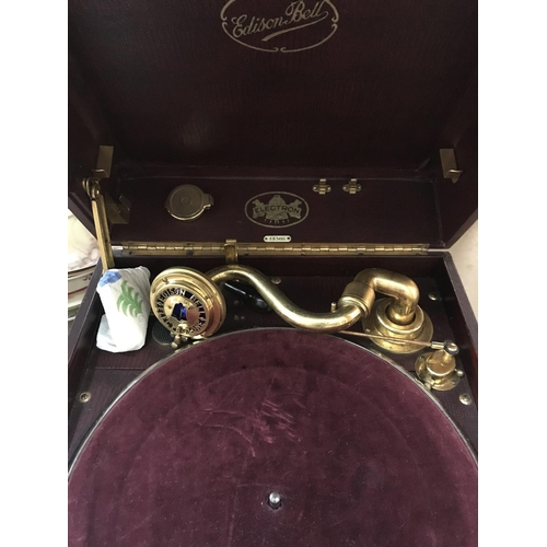 1621 - A Edison Bell Electron table top gramophone fitted in a red case .