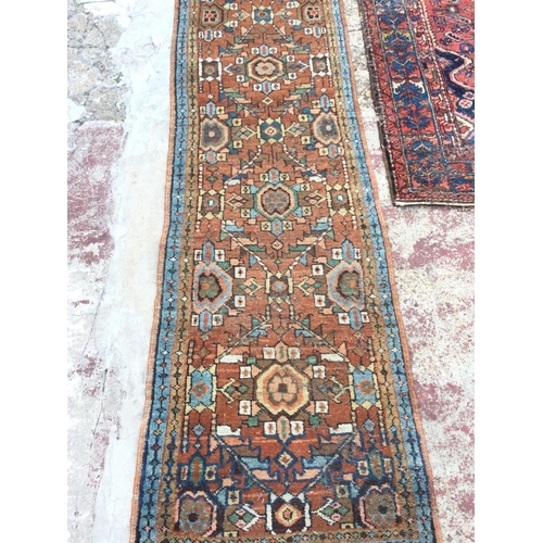 1654 - Hand knotted rugs, dimensions 190x126cm & 278x62cm postage cat D