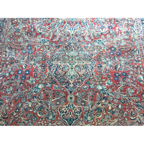 1655 - A large hand knotted rug, approximate dimensions 300x240cm postage category D