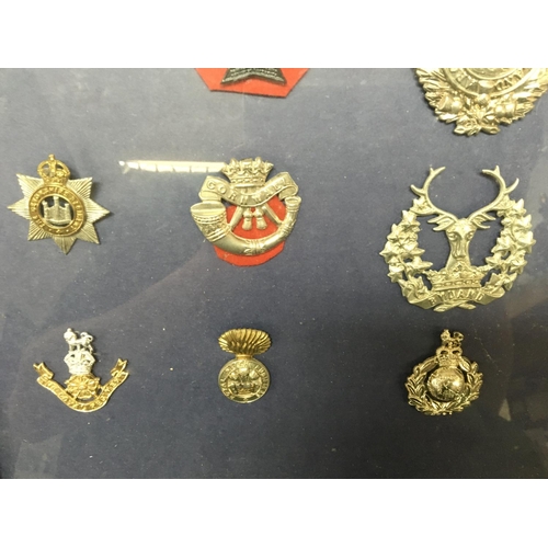 1925 - Cased Cap badges and a box of various cap badges- including the Kings Royal Rifle Corps, Gordan High... 