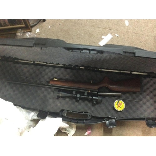 1930 - A SMK 5.5mm/.22 calibre bolt action air rifle with oversized double gun hard case