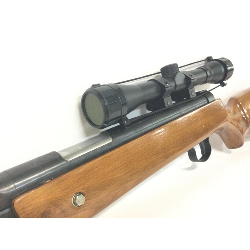 1931 - An unmarked air rifle with sight, including soft case and a boxed Dragon Claw Clamp on Bipod