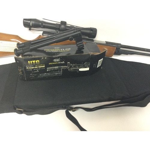 1931 - An unmarked air rifle with sight, including soft case and a boxed Dragon Claw Clamp on Bipod