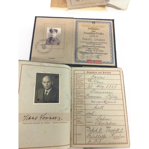 1940 - A collection of WW2 Third Reich documents, papers, ID cards, Ahnenpass (ancestral passport). The lea... 