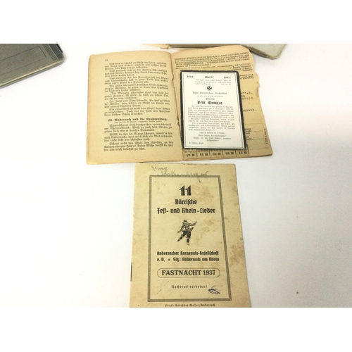 1940 - A collection of WW2 Third Reich documents, papers, ID cards, Ahnenpass (ancestral passport). The lea... 