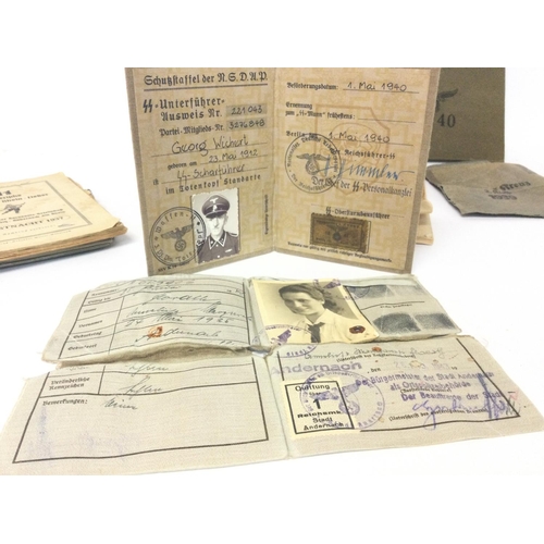 1940 - A collection of WW2 Third Reich documents, papers, ID cards, Ahnenpass (ancestral passport). The lea... 