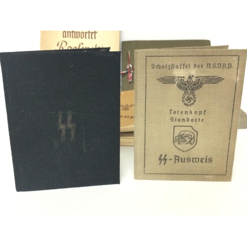 1940 - A collection of WW2 Third Reich documents, papers, ID cards, Ahnenpass (ancestral passport). The lea... 