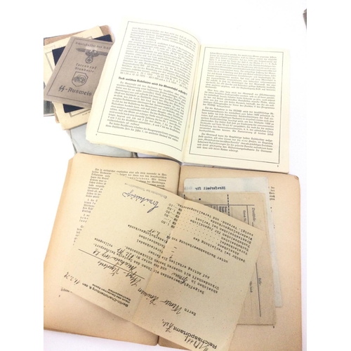 1940 - A collection of WW2 Third Reich documents, papers, ID cards, Ahnenpass (ancestral passport). The lea... 