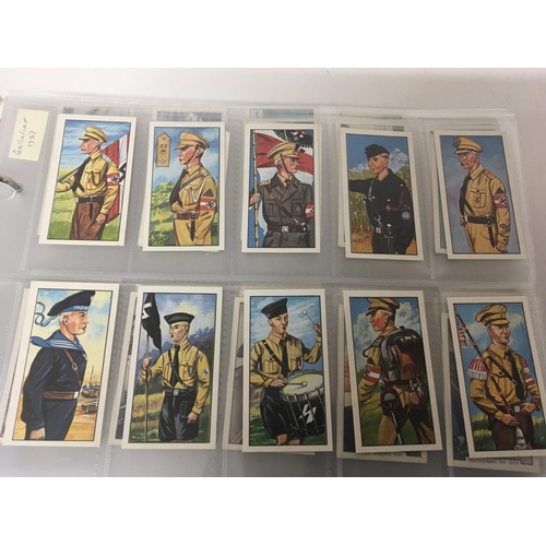 2014 - An album containing a well presented collection of picture cards and cigarette cards including vinta... 