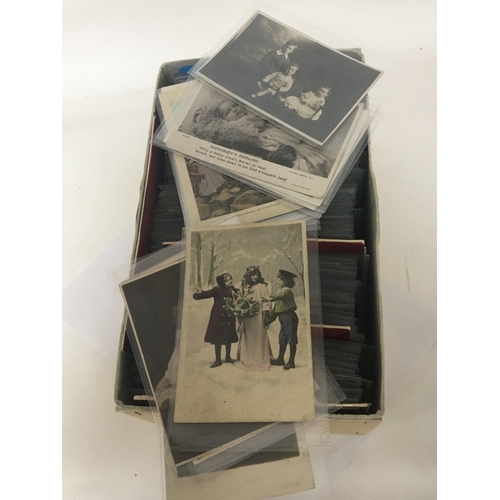 2015 - A box containing a quantity of well presented postcards mainly people studies portraits and others. ... 