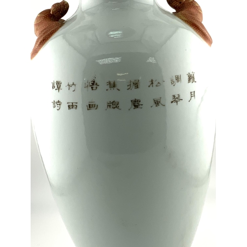 908 - A Chinese Famille Rose Vase with hand painted scene depicting an Empress and her followers, 18.5cm. ... 