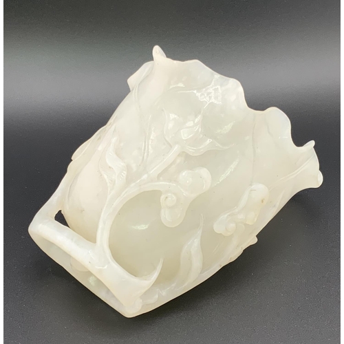 912 - A Chinese carved white jade vase In furled lotus leaf form with ruyi and vine decoration, 10cm toget... 