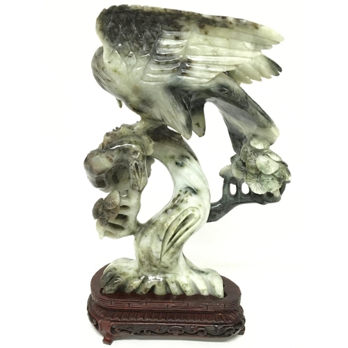 917 - A boxed Jade eagle figure, 27cm tall. postage category D