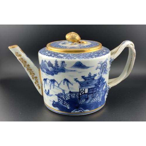 919 - A 19thC Chinese export porcelain teapot with gilt decoration, (hairline to body). H.13cm x 21cm x 12... 