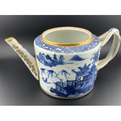 919 - A 19thC Chinese export porcelain teapot with gilt decoration, (hairline to body). H.13cm x 21cm x 12... 