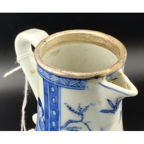 925 - An early chinese blue and white porcelain sparrow beak jug and cover with a white metal rim. Undergl... 