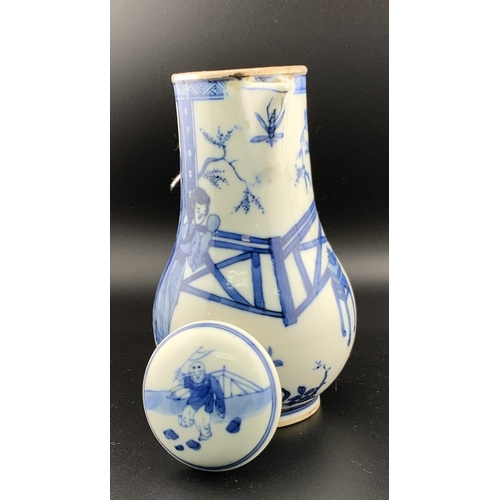 925 - An early chinese blue and white porcelain sparrow beak jug and cover with a white metal rim. Undergl... 