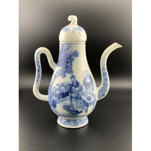 926 - A Chinese blue and white porcelain teapot with a water dropper style spout, underglazes flower mark ... 