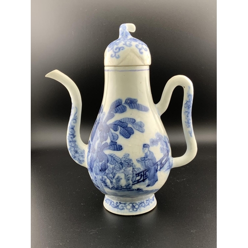 926 - A Chinese blue and white porcelain teapot with a water dropper style spout, underglazes flower mark ... 