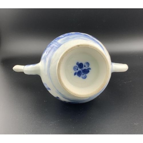 926 - A Chinese blue and white porcelain teapot with a water dropper style spout, underglazes flower mark ... 