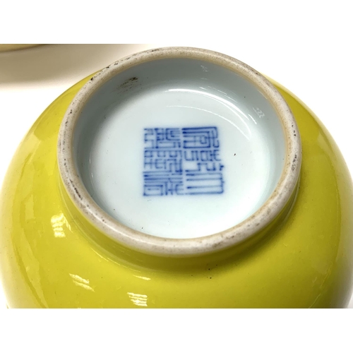 928 - A yellow glazed Chinese porcelain bowl with underglaze blue mark to base, (good condition) 12.5cm x ... 