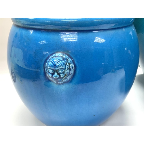 940 - A large Chinese Turquoise blue jardiniere with lion motif handles, under-glazed mark to base (Good c... 