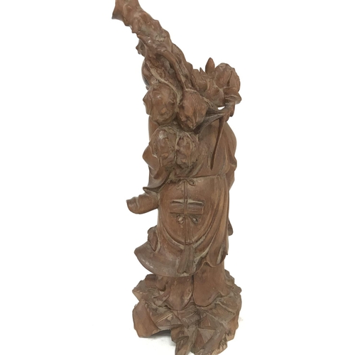 945 - Vintage carved oriental figure of Shou Lao the god of longevity, 37cm tall. Postage category B